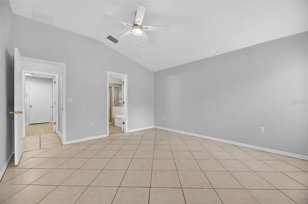 a white toilet sitting next to a bathroom