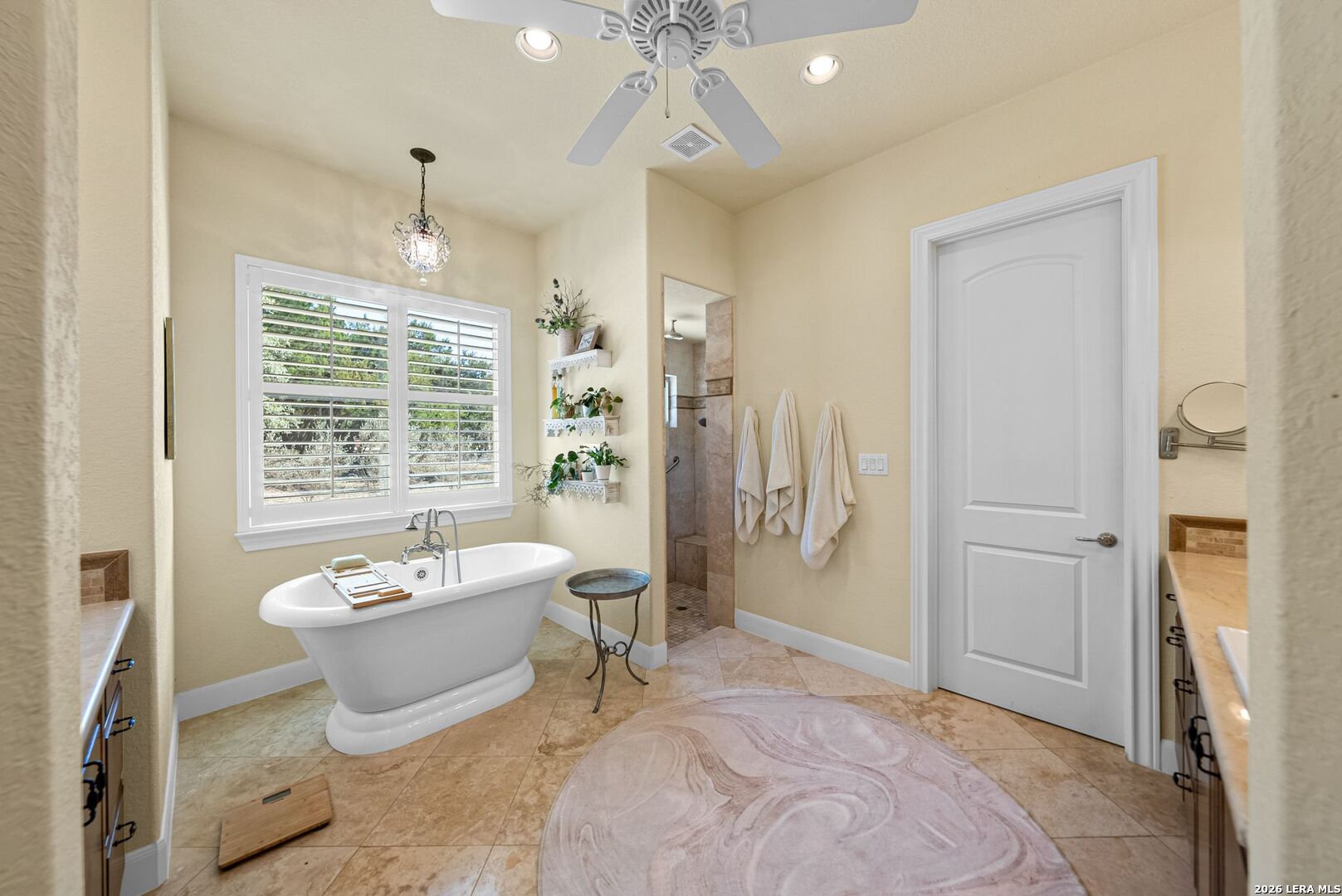 970 Flightline Spring Branch, TX 78070 - Photo 13 of 40 a spacious bathroom with a bathtub sink and toilet
