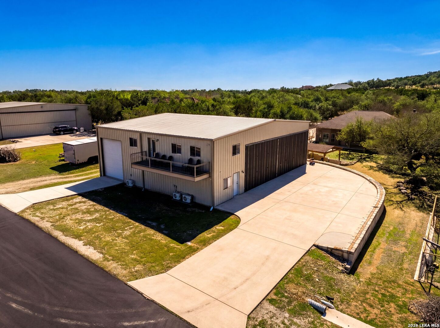 970 Flightline Spring Branch, TX 78070 - Photo 33 of 40 a view of a terrace with a lake view