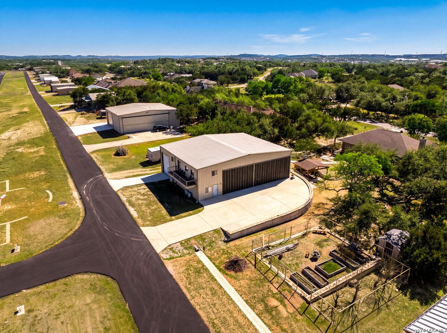 970 Flightline Spring Branch, TX 78070 - Photo 34 of 40 an aerial view of a house with a ocean view