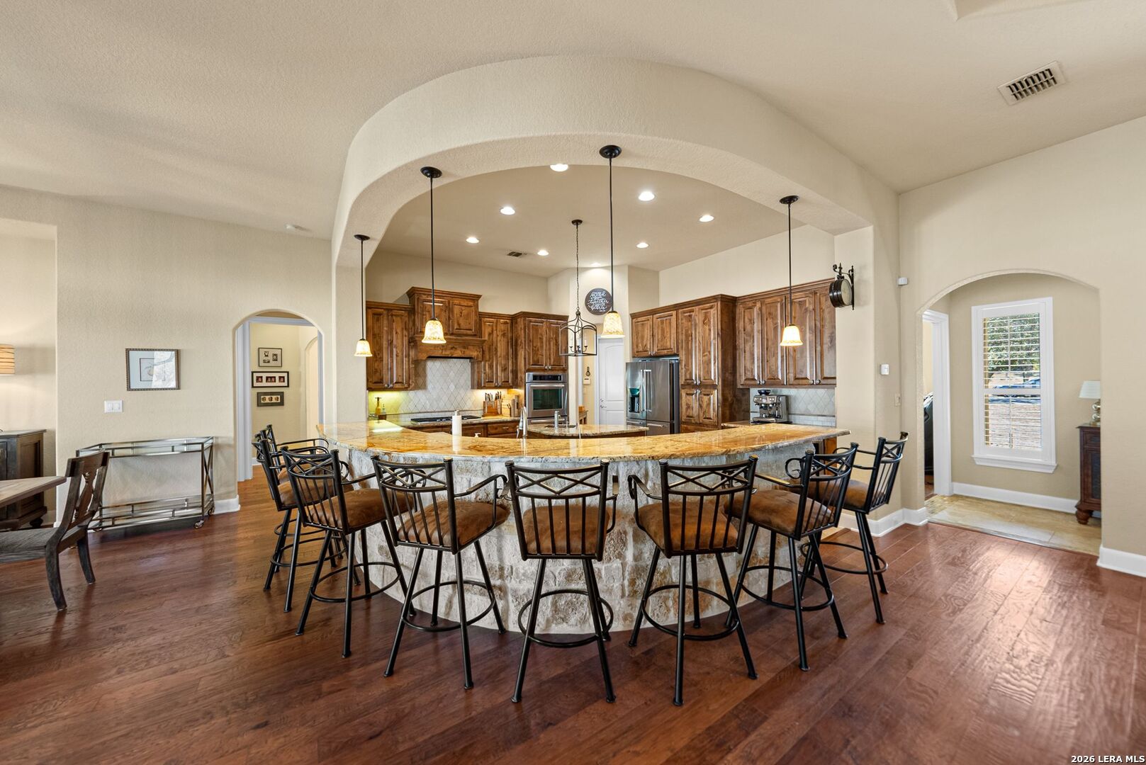 970 Flightline Spring Branch, TX 78070 - Photo 6 of 40 a dining hall with wooden floor table and chairs