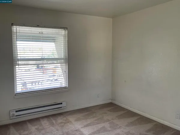 a view of a room with a window