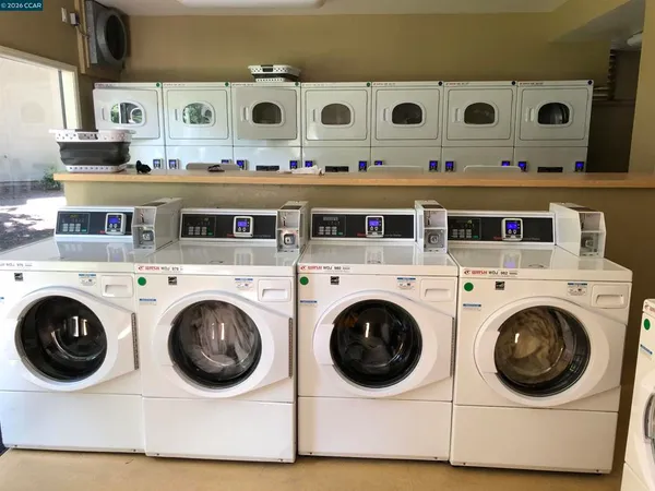 a utility room with dryer and washer