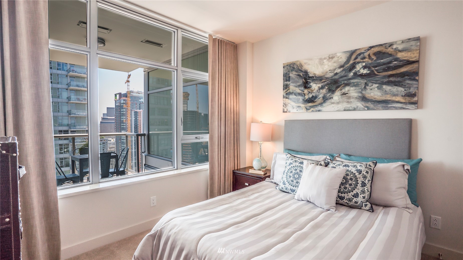 583 Battery Street, Unit 3207N Seattle, WA 98121 - Photo 10 of 22 a bedroom with a large bed and a window with outer view