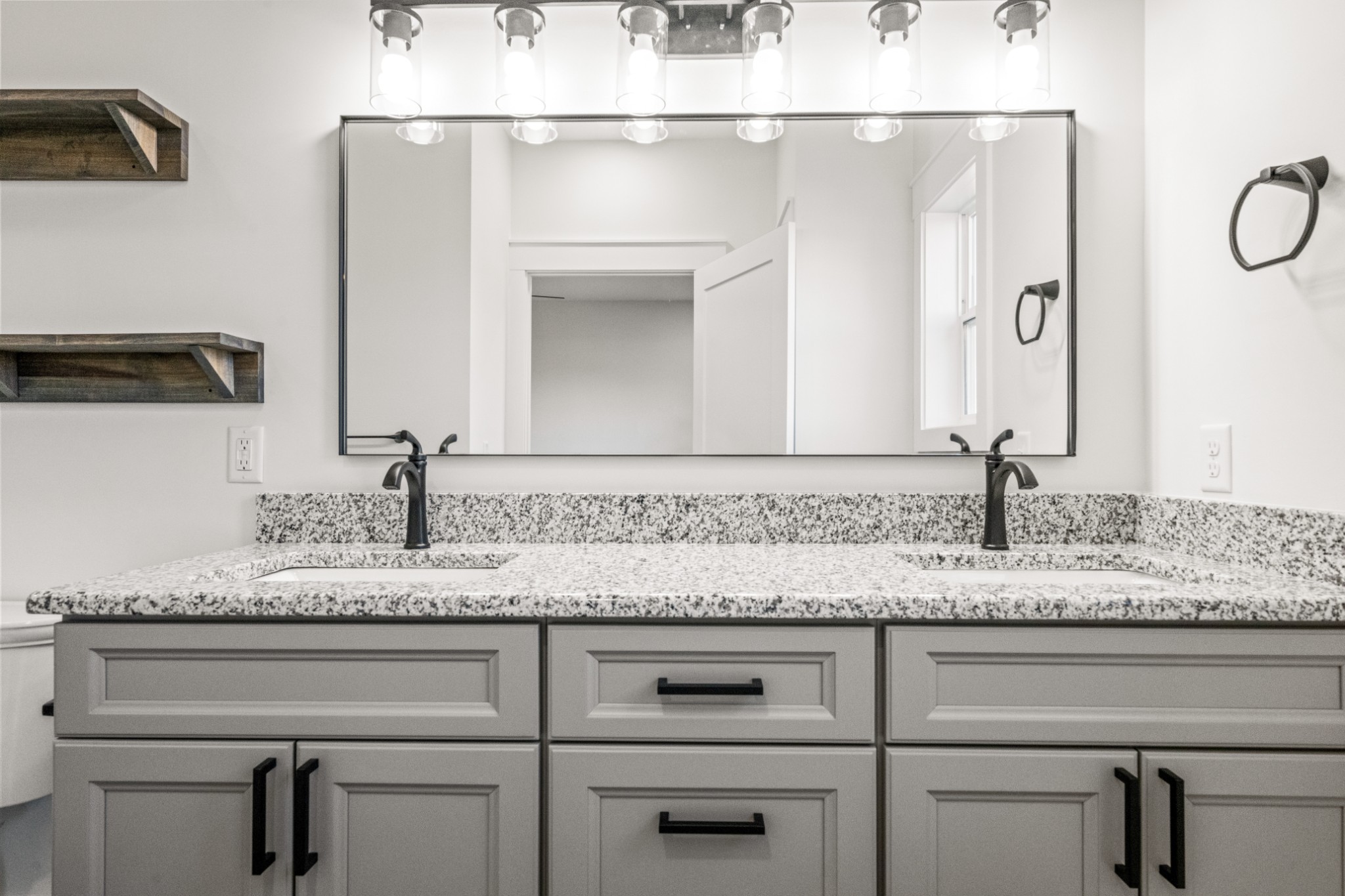 9345 Fox Hill Road Baxter, TN 38544 - Photo 36 of 54 a sink with a granite countertop white vanity and a sink