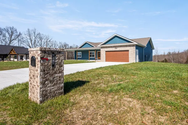 a view of a backyard of a house