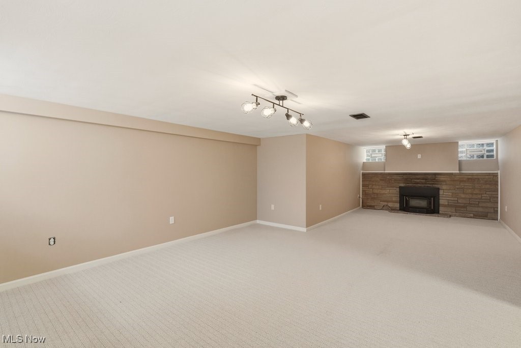 6119 East Sprague Road Independence, OH 44131 - Photo 43 of 45 lower level rec room with wood burning fireplace