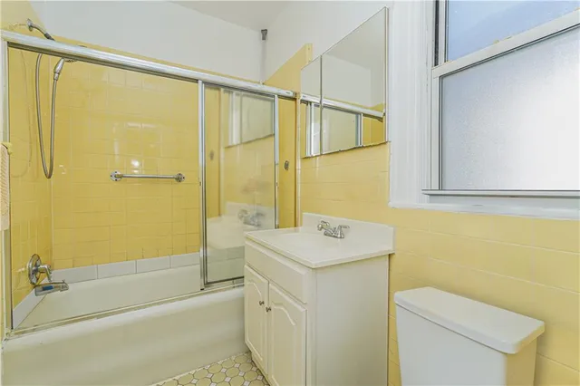 a view of a street with a building in the background