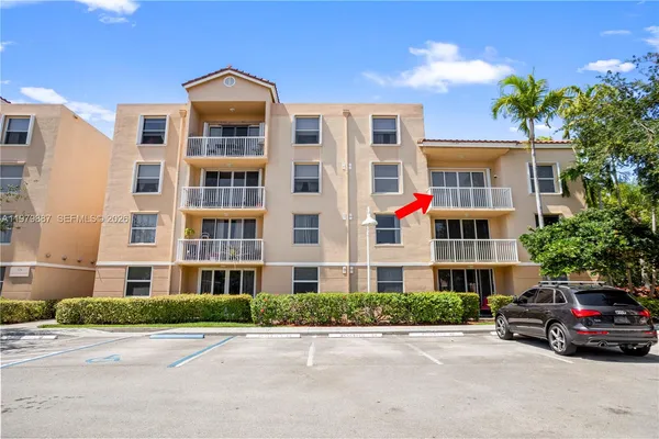 front view of a building next to a yard