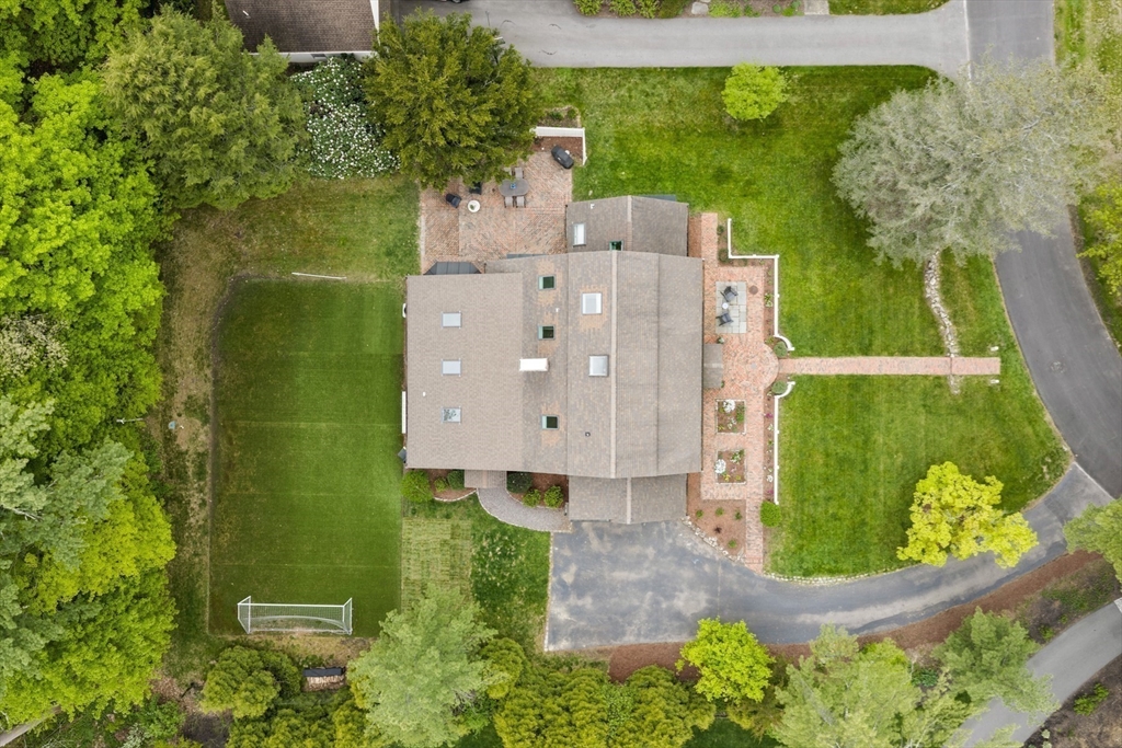41 Longmeadow Road Wellesley, MA 02482 - Photo 37 of 41 an aerial view of a house with a garden