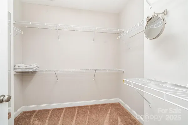a view of a room with racks on the wall