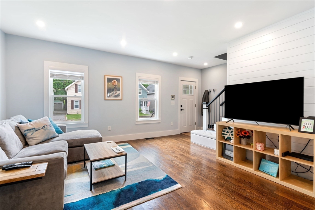 18 Harding Terrace Dedham, MA 02026 - Photo 12 of 38 a living room with furniture and a flat screen tv