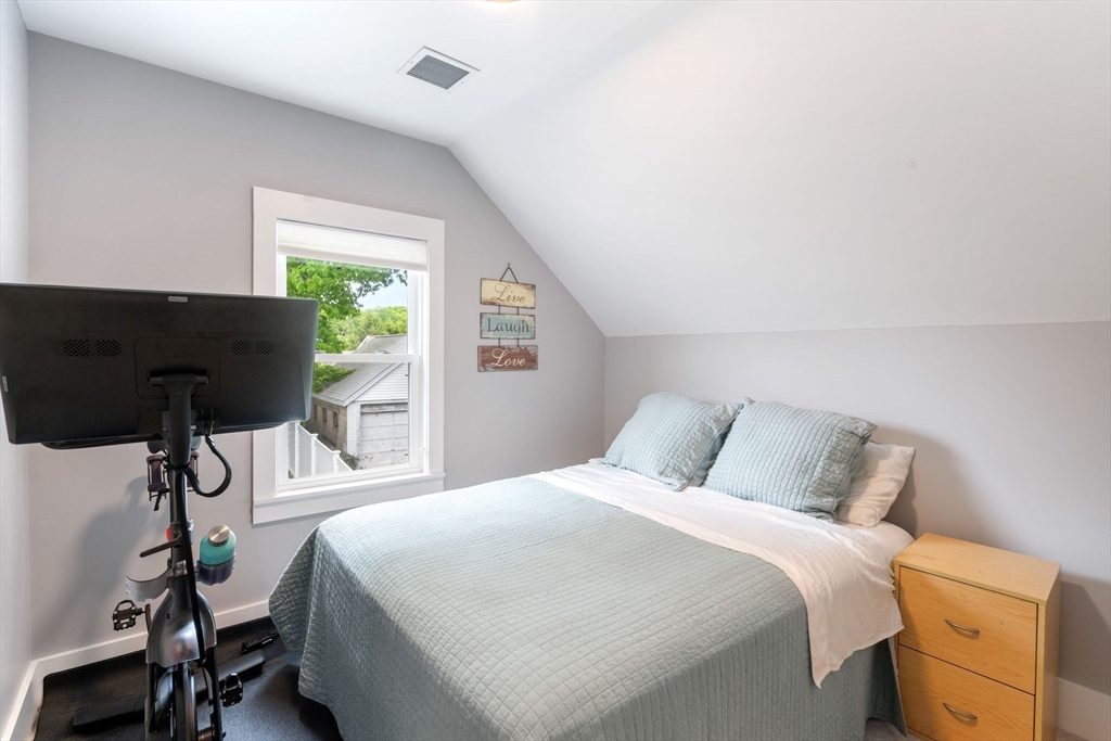 18 Harding Terrace Dedham, MA 02026 - Photo 22 of 38 a bedroom with a bed and a window