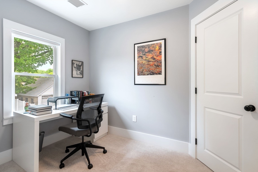 18 Harding Terrace Dedham, MA 02026 - Photo 24 of 38 a view of a workspace with furniture and a window
