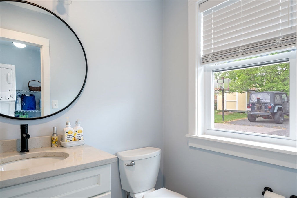 18 Harding Terrace Dedham, MA 02026 - Photo 25 of 38 a bathroom with a toilet a sink and a mirror