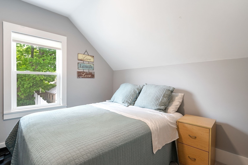 18 Harding Terrace Dedham, MA 02026 - Photo 5 of 38 a bedroom with a bed and a window