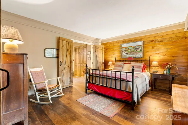 a bed room with a bed and a window