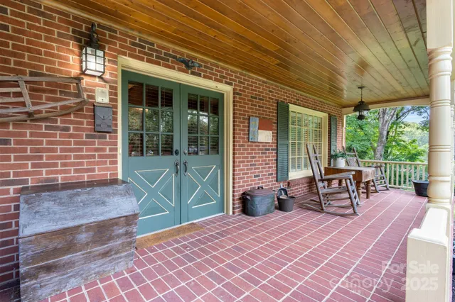 a backyard of a house with seating space