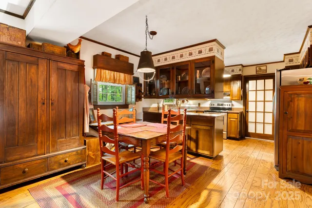 a view of a patio with a table and chairs