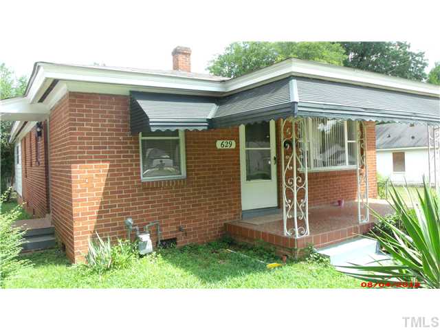 629 Coleman Street Raleigh, NC 27610 - Photo 1 of 25 a front view of a house with a yard