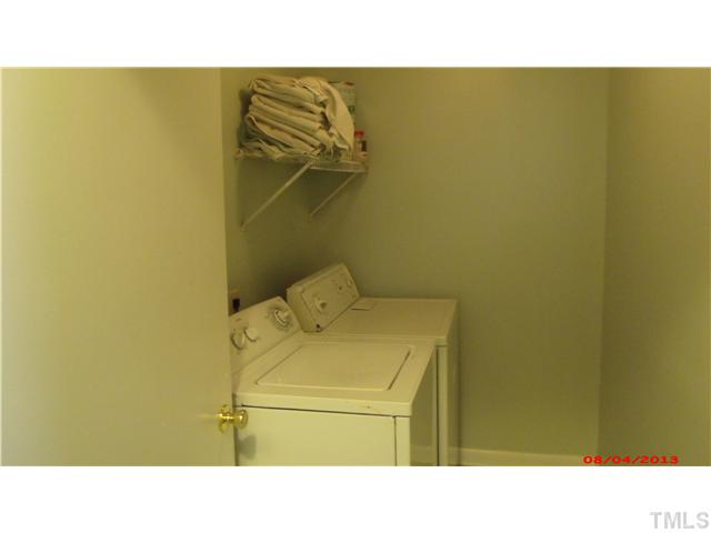 629 Coleman Street Raleigh, NC 27610 - Photo 22 of 25 a bathroom with a sink and a mirror