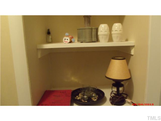 629 Coleman Street Raleigh, NC 27610 - Photo 5 of 25 a bathroom with a sink and a mirror