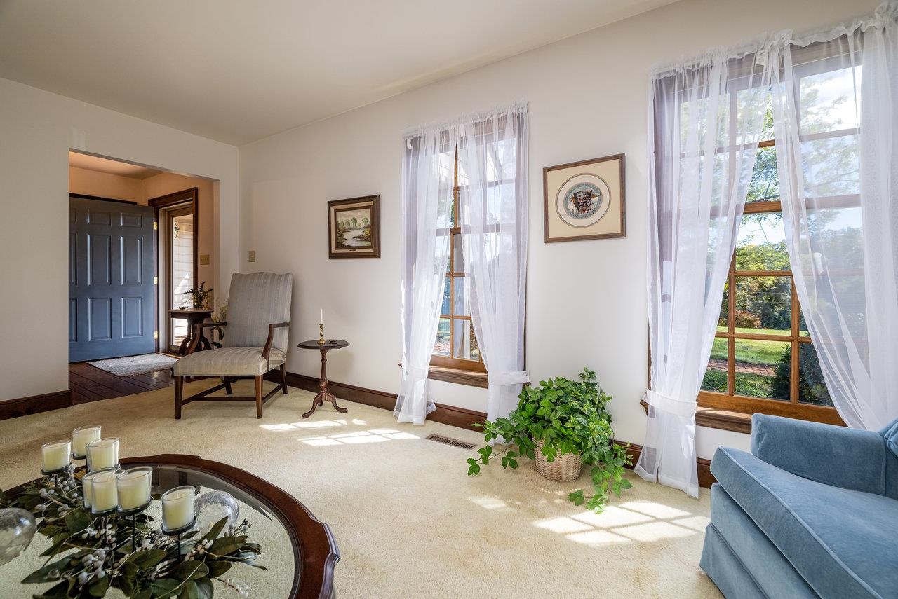 223 Fadley Road Weyers Cave, VA 24486 - Photo 28 of 59 a living room with furniture and a large window