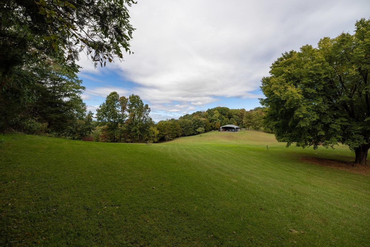 223 Fadley Road Weyers Cave, VA 24486 - Photo 10 of 59 a view of a field of grass and trees
