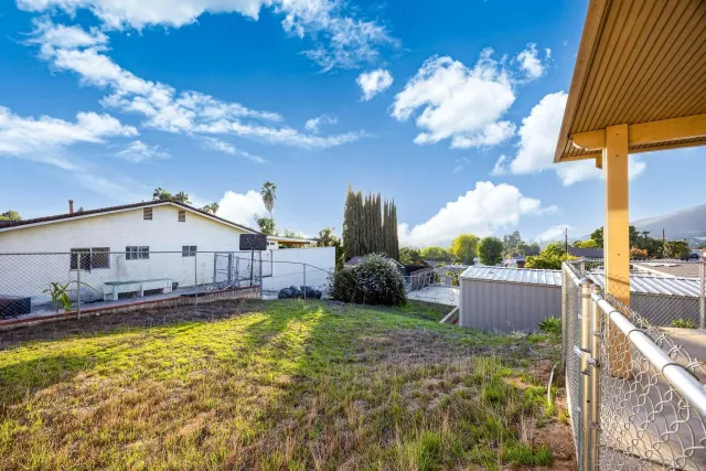 a view of a house with swimming pool yard and mountain view