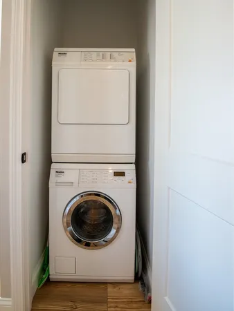 a utility room with dryer and washer