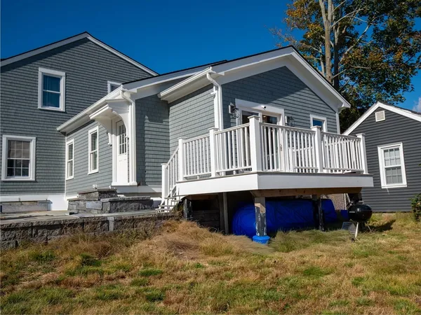 a front view of a house with swimming pool