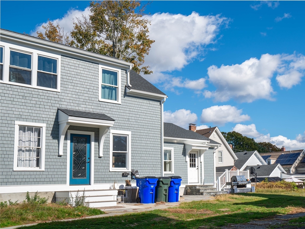 93 Grove Street, Unit 1R Fall River, MA 02720 - Photo 20 of 21 a view of a yard in front of a house