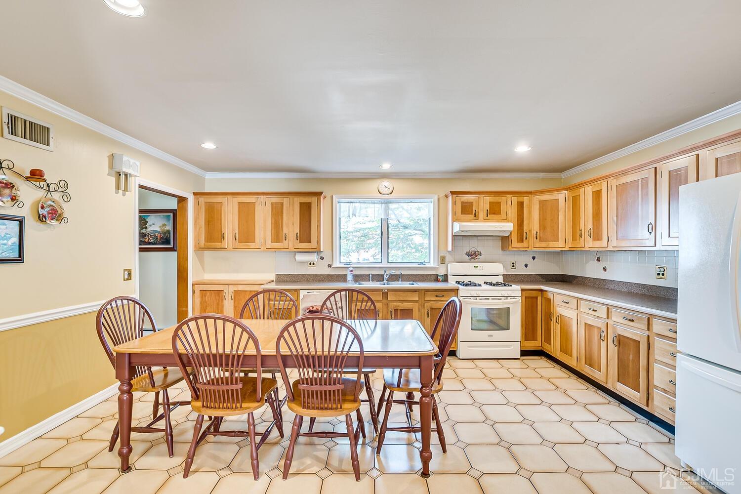 7 Paley Place Edison, NJ 08817 - Photo 11 of 53 a view of a dining room with furniture and wooden floor