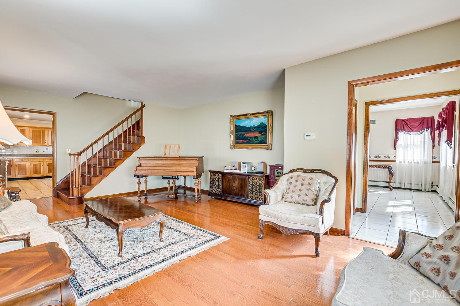 7 Paley Place Edison, NJ 08817 - Photo 16 of 53 a living room with furniture and a rug