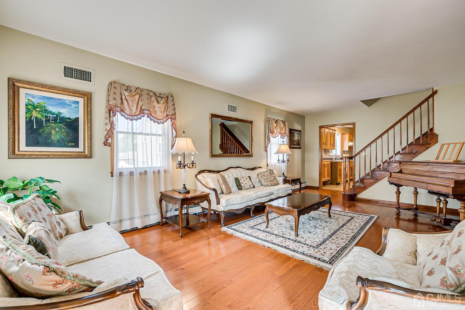 7 Paley Place Edison, NJ 08817 - Photo 17 of 53 a living room with furniture a rug and a window