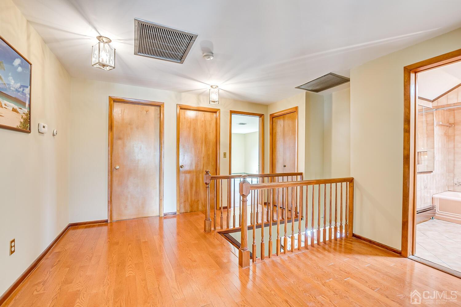 7 Paley Place Edison, NJ 08817 - Photo 24 of 53 a view of empty room with wooden floor and fan