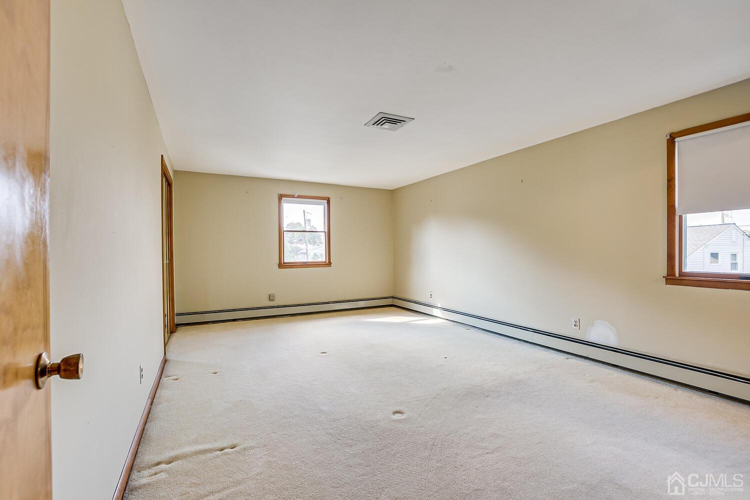 7 Paley Place Edison, NJ 08817 - Photo 25 of 53 a view of an empty room with a window