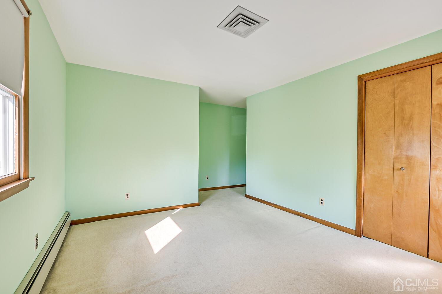7 Paley Place Edison, NJ 08817 - Photo 29 of 53 a view of an empty room with a window