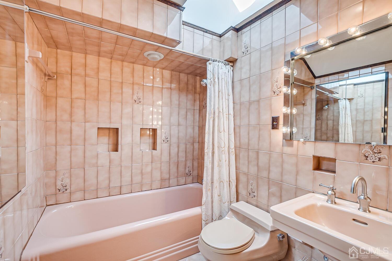 7 Paley Place Edison, NJ 08817 - Photo 36 of 53 a bathroom with a sink toilet and shower