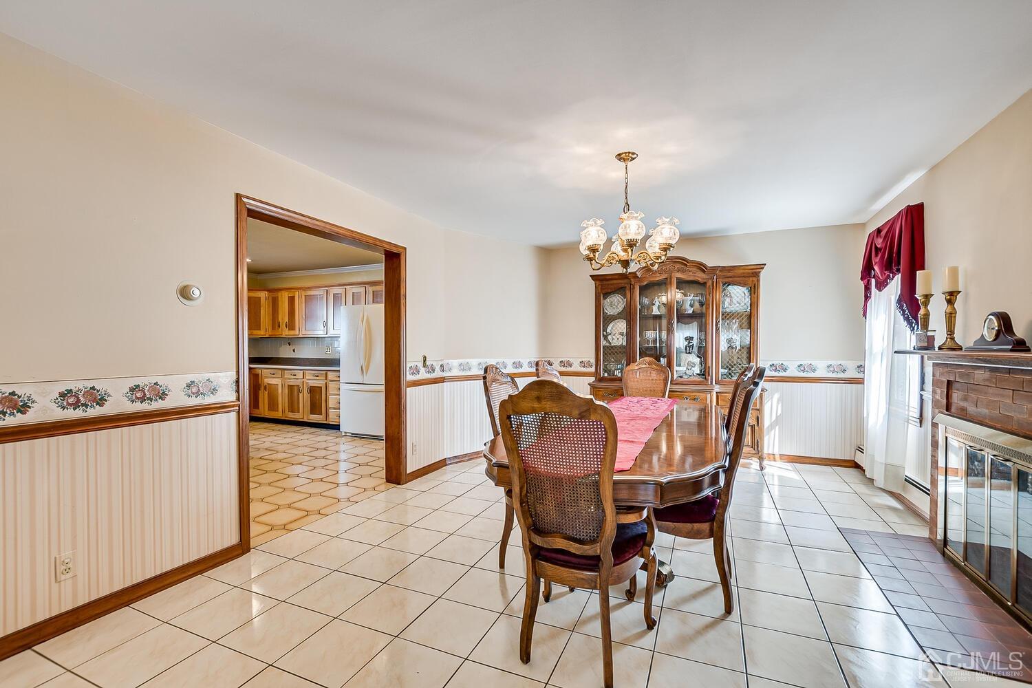 7 Paley Place Edison, NJ 08817 - Photo 9 of 53 a dining room with furniture and chandelier kitchen view