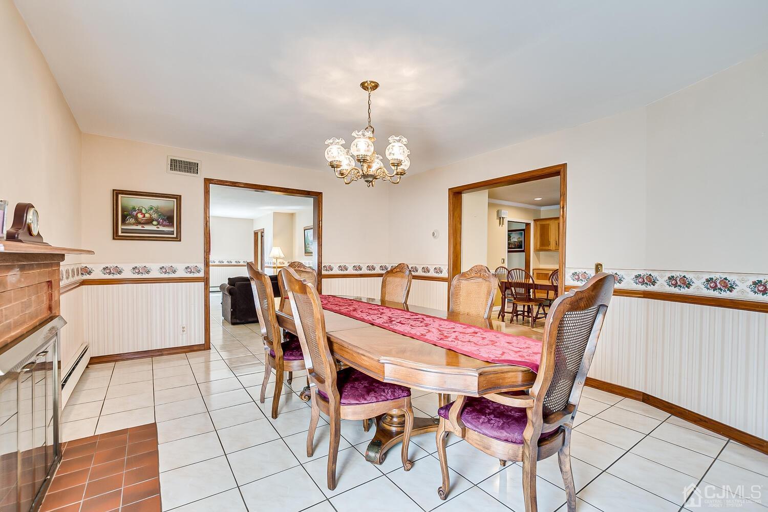 7 Paley Place Edison, NJ 08817 - Photo 10 of 53 a dining room with furniture and window
