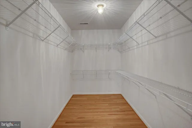 a view of a room with racks on the wall