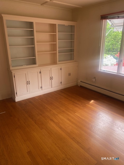 33 Flanders Road Bethlehem, CT 06751 - Photo 12 of 18 an empty room with a empty space and a window