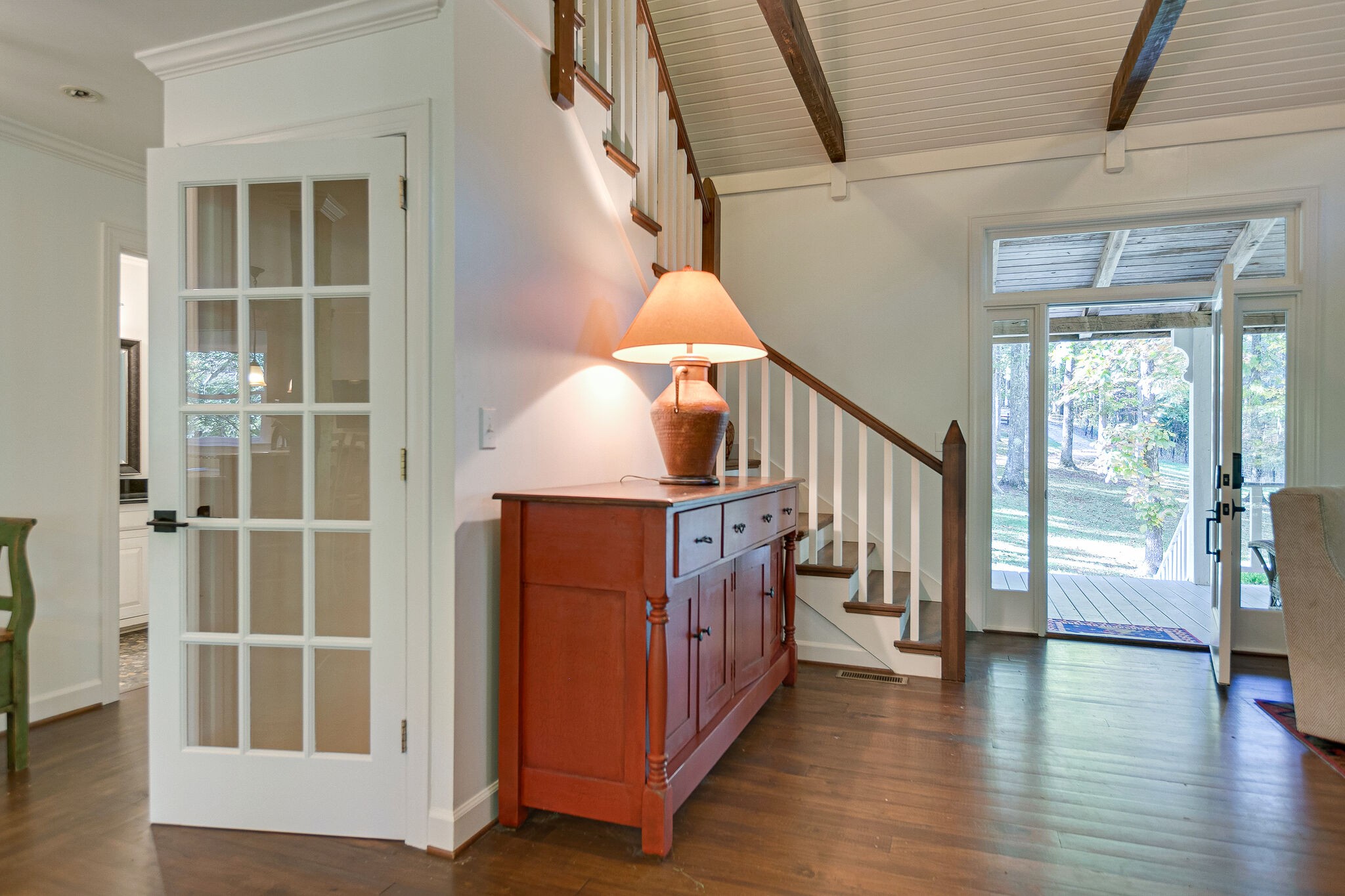 5629 Pinewood Road Franklin, TN 37064 - Photo 11 of 49 a hallway with a large window and wooden floor