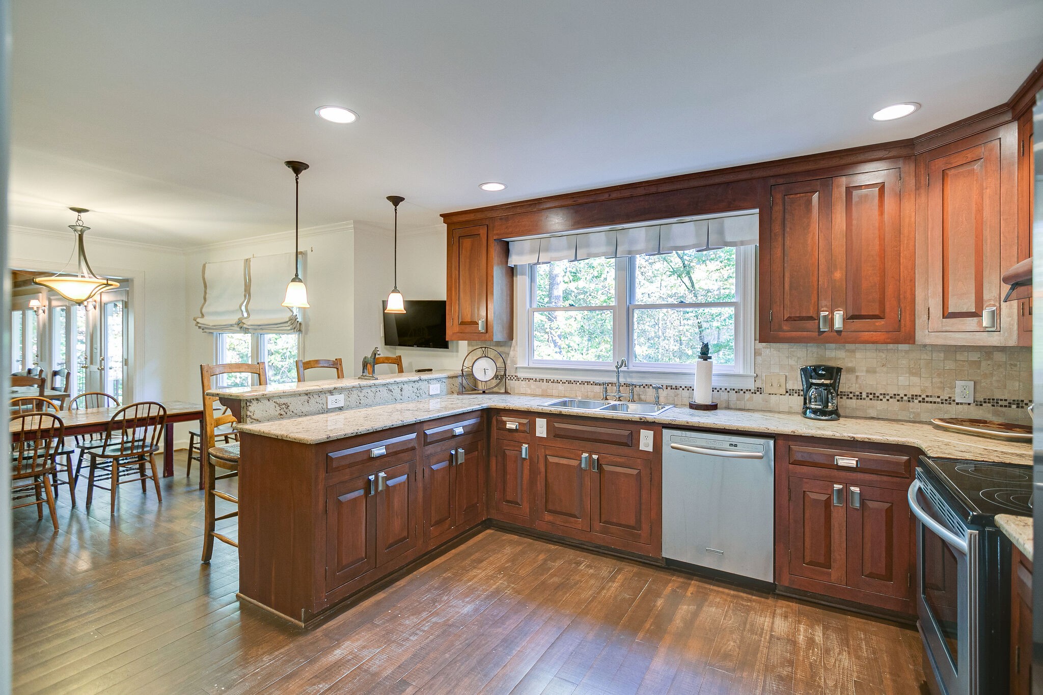 5629 Pinewood Road Franklin, TN 37064 - Photo 13 of 49 a kitchen with a sink cabinets and wooden floor