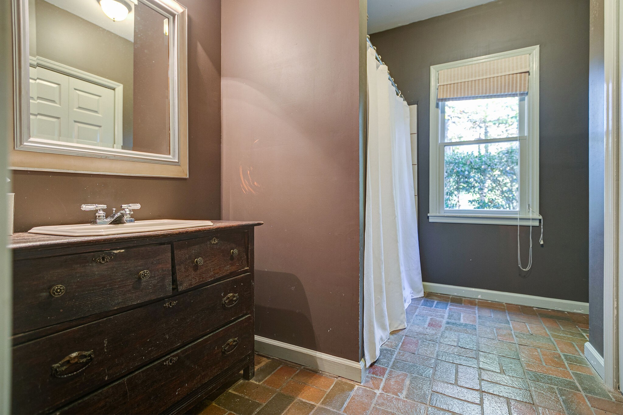 5629 Pinewood Road Franklin, TN 37064 - Photo 23 of 49 a bathroom with a sink and a mirror