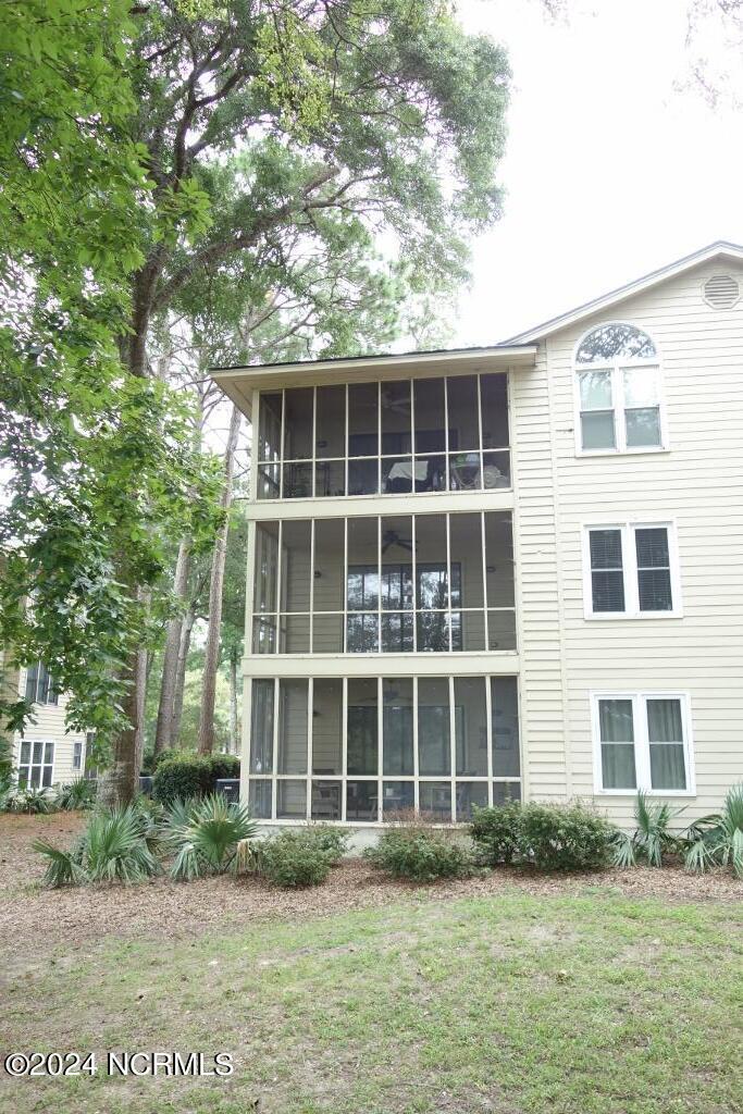 221 Clubhouse Road, Unit 4 Sunset Beach, NC 28468 - Photo 6 of 52 Rear View