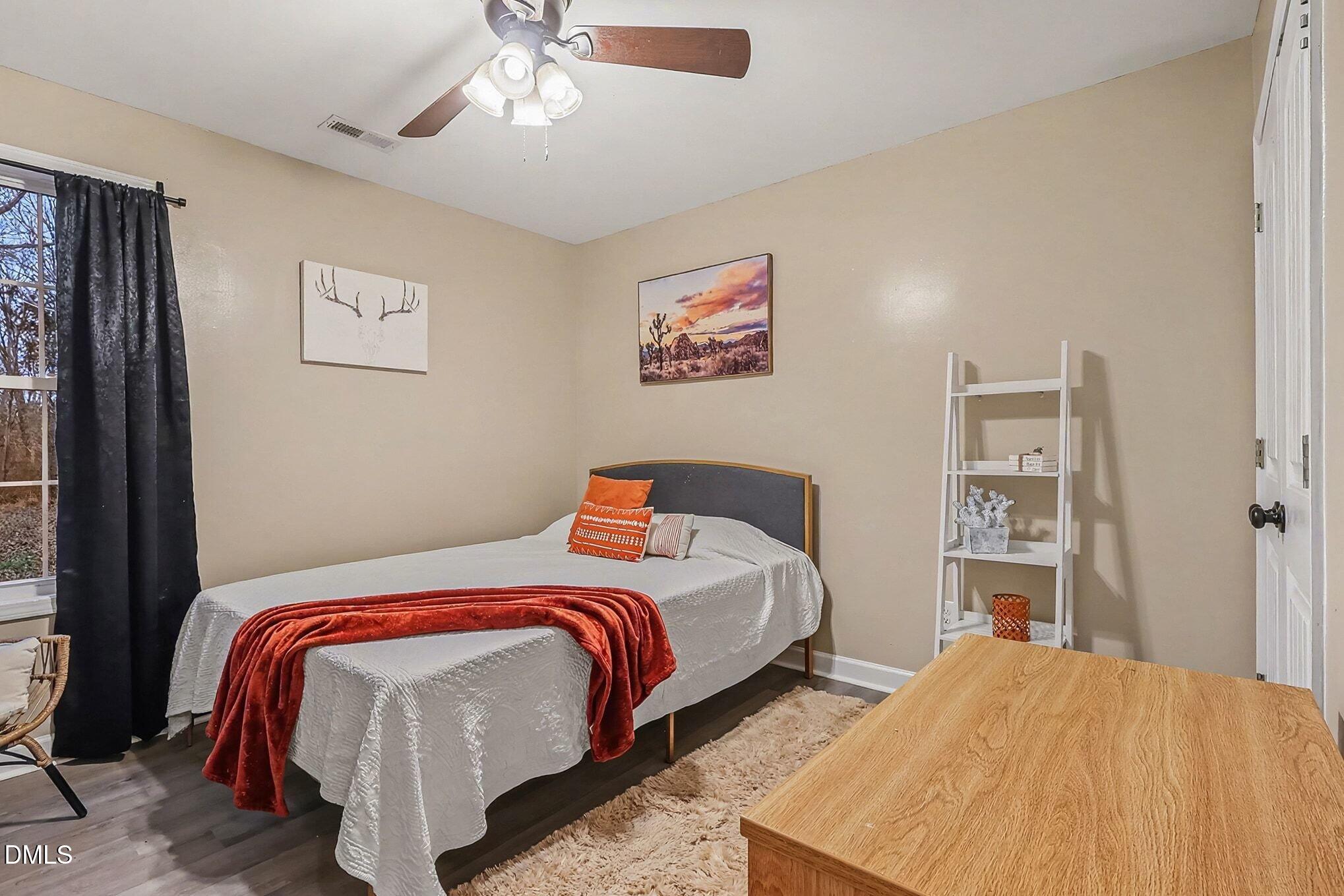 115 Southern High School Road Graham, NC 27253 - Photo 23 of 34 a bedroom with bed and window