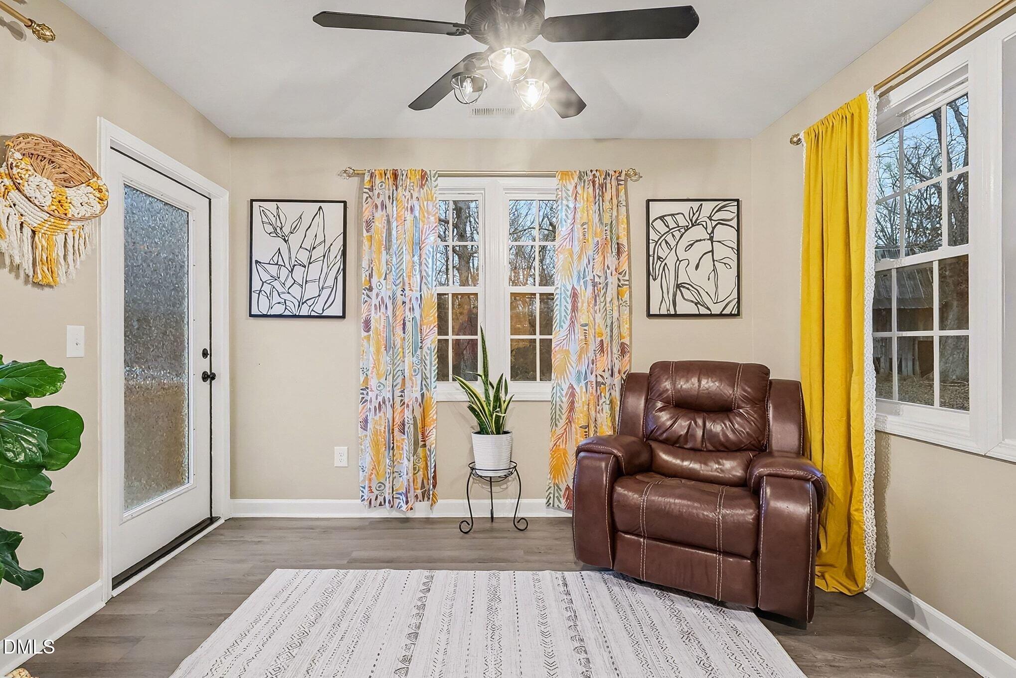 115 Southern High School Road Graham, NC 27253 - Photo 25 of 34 a living room with furniture and a window
