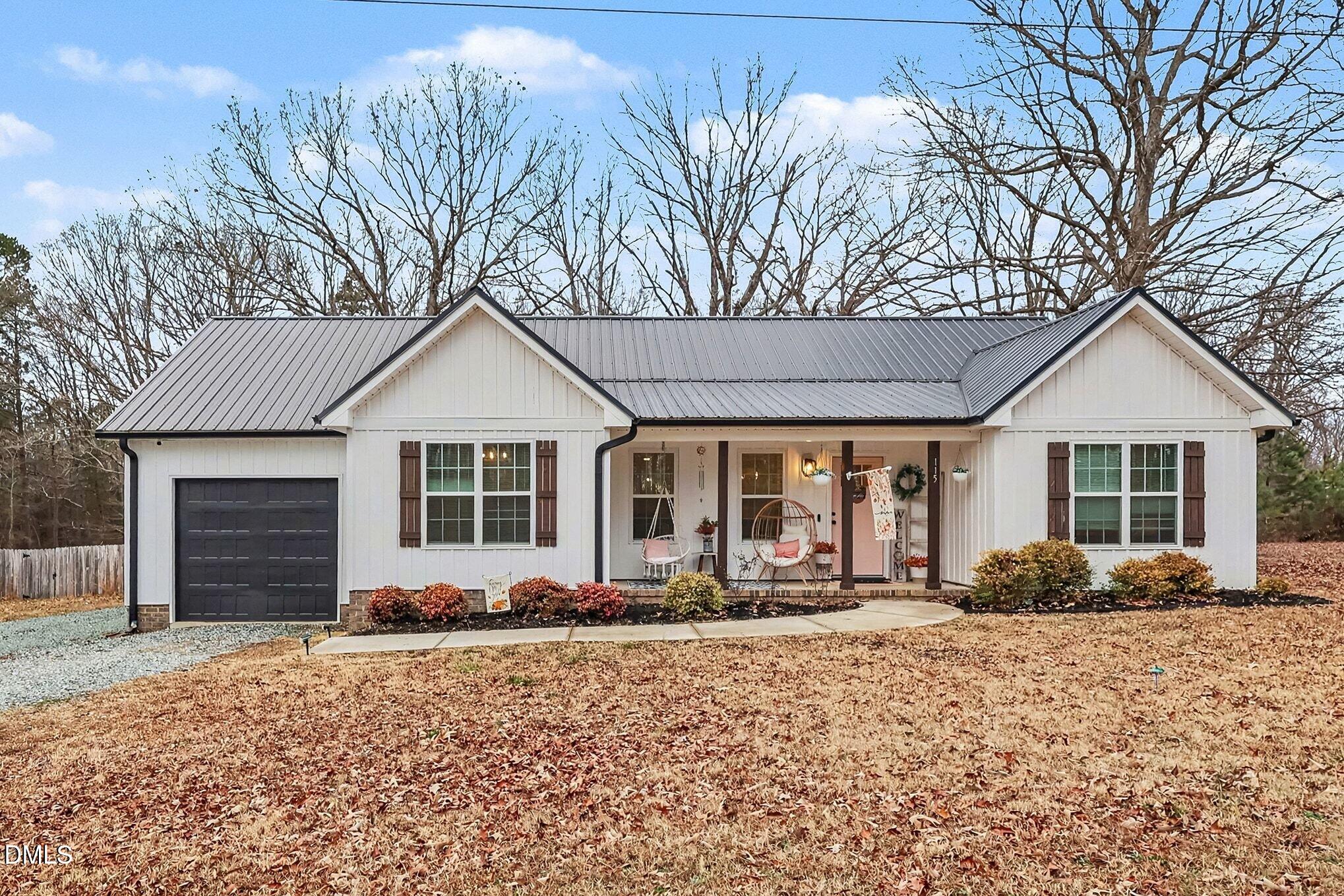 115 Southern High School Road Graham, NC 27253 - Photo 6 of 34 a front view of a house with a yard
